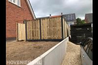 Schutting met tuinpoort