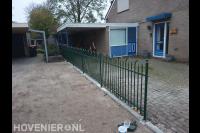 Sierhekwerk plaatsen langs oprit