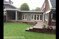 Tuinaanleg met verhoogd terras en gazon van graszoden 1