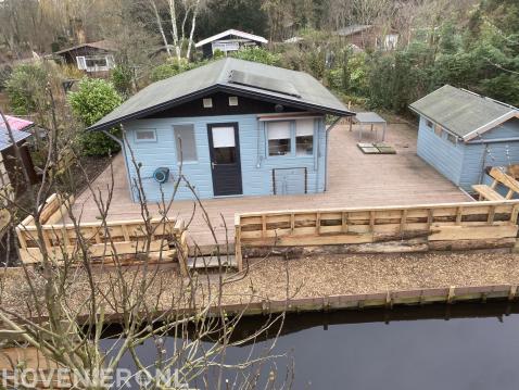 renovatie tuinhuis , vlonder, reling en schuttingen