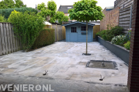 Achtertuin bestraten