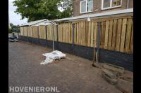 Hout beton schutting plaatsen
