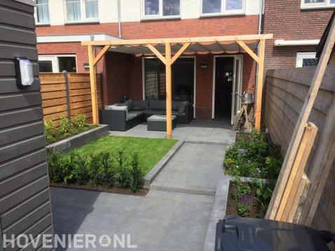 Houten overkapping met harmonicadoek