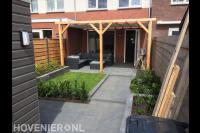 Houten overkapping met harmonicadoek