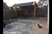 Achtertuin bestraten