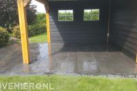 Bestrating leggen onder overkapping