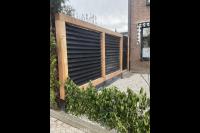 Houten schutting met verschillende kleuren