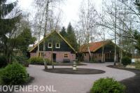 Bestrating van oprit naar boerderij