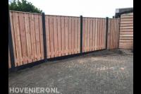 Hout beton schutting met tuindeur