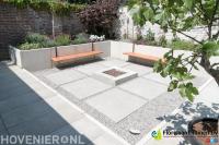 Onderhoudsarme tuin met bestrating en verhoogde borders