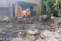 Tuin afgraven met minigraver