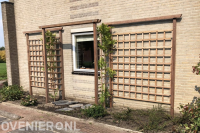 Houten pergola met trellisschermen