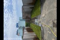 Betontegels terras met straks gazon