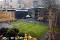 Tuinaanleg met gazon, terrasoverkapping en vlonder