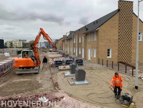 Bestraten van openbare weg in nieuwbouwwijk 2