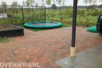 Bestrating van gekleurde klinkers in waalformaat