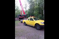 Truck met aanhanger van Boomrooierij Oving