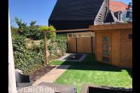 Houten schuurtje met pergola