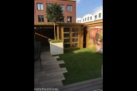 Vlonderterras met loungeset en houten overkapping met schuurtje 2