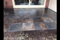 Terras aanleggen met natuursteen tegels