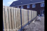 Hout beton schutting plaatsen