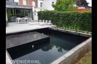 Zwemvijver met helofytenfilter en zonneterras