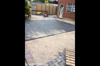 Achtertuin bestraten