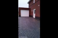 Oprit bestraten met betonklinkers