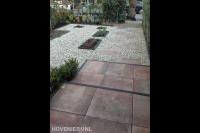 Onderhoudsarme tuin met bestrating en grind