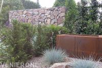 Tuin met accenten van steen en cortenstaal 2