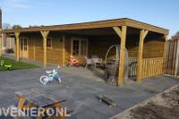 Houten tuinhuis met grote overkapping