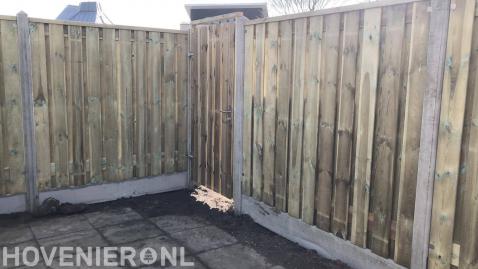 Hout beton schutting met tuinpoort