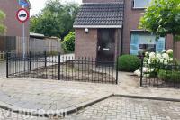 Sierhekwerk om voortuin