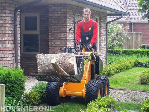 Minishovel voor zwaar hout en takken