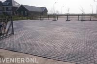Erf bestraten met  betonklinkers