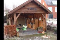Grote houten overkapping met buitenkeuken 1