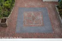 Bestrating in achtertuin met ster patroon