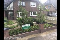 Aanleggen voortuin met grindpaden tussen borders met vaste planten 1