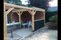 Houten veranda met pergola