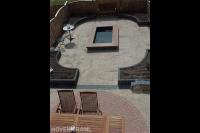 Tuinaanleg met sierbestrating en verhoogde borders