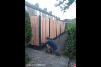 Hout beton schutting plaatsen