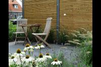 Terras voor beton houten schutting