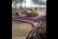 Openbare weg bestraten