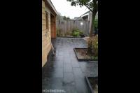 Straatwerk van natuursteen tegels