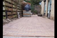 Bestrating van rode klinkers in waalformaat