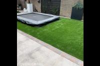 Kunstgrasmat met trampoline