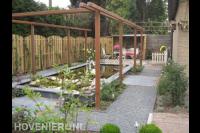 Achtertuin met vijver en pergola 1