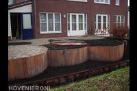 Houten beschoeiing in ronde vormen