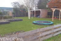 Gazon met ingebouwde trampoline