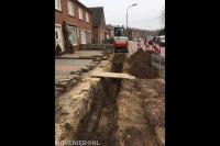 Sleuf graven met minigraver